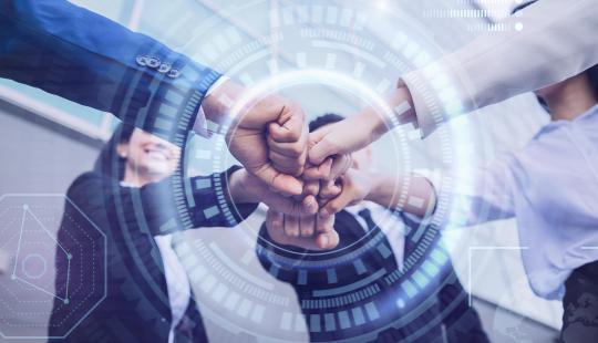 Five people fist-bump with a circular overlay